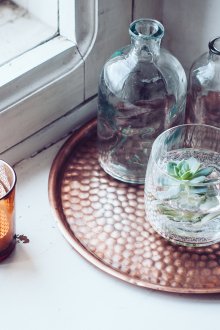 Candles with a boho-style tray