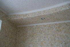 Beige liquid wallpaper on the ceiling