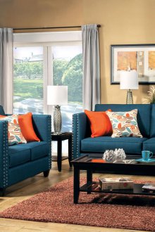 Син диван с нитове