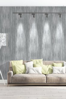 Сива всекидневна със зелени възглавници на дивана