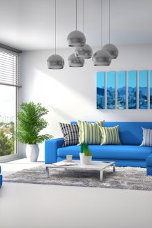 Син диван в сива всекидневна