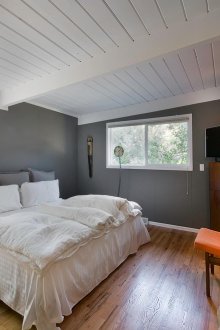 Scandinavian-style bedroom with gray walls