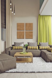 Bright living room with green accents