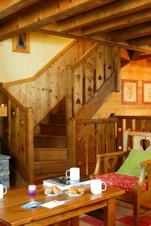 Living room with a rustic fireplace