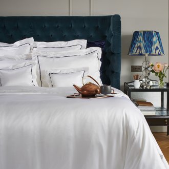 Selimut sutera dengan paip