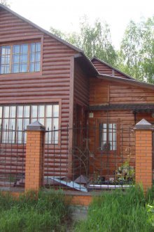 Изложение на селска къща с метален сайдинг