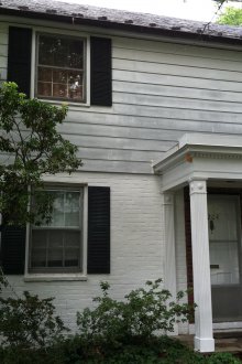 Facing the house with acrylic siding