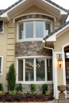 Stone siding for bay window