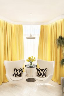 Bright yellow curtains in the living room