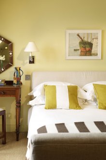 Pastel yellow walls in the bedroom