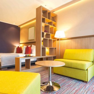 Yellow armchairs in a studio apartment