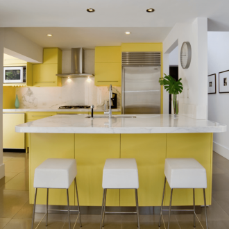 Yellow color enlivens the kitchen, makes the interior more interesting