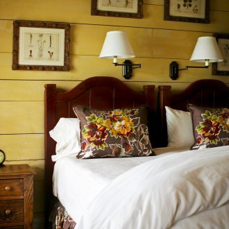 Yellow walls in a country bedroom