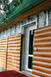 Изправяне на сайдинг под щанга