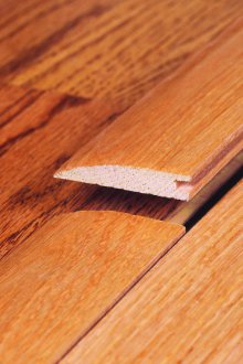 Полагане на прага за ламината