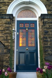 Arched visor above the entrance