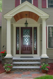 Visor above the entrance with columns