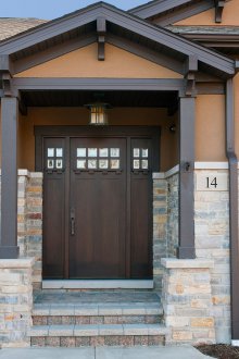 Dark wood entrance canopy