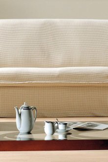 Tutup untuk sofa dengan busur