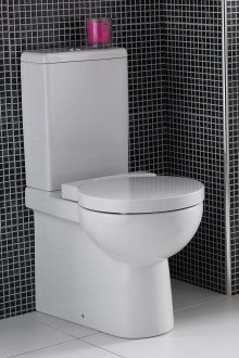 Компактна тоалетна с косо освобождаване