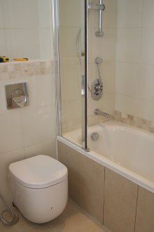 Beige bathroom without sink