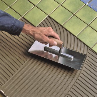 Meletakkan jubin untuk kalis air