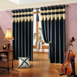 Black and beige curtains on grommets in the interior