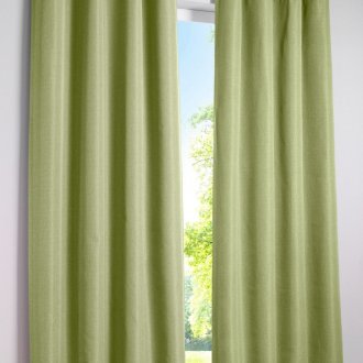 Green curtains on grommets