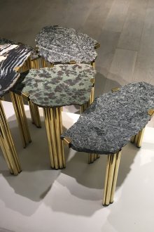 Coffee tables made of metal tubes and stone countertops