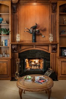 Round coffee table made of wood and wicker rattan in a country style living room