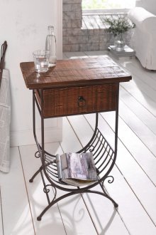 Coffee table in country style made of metal and wood.