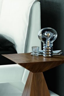 Unusual geometric wooden table with a lamp