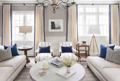 A beautiful combination of beige, blue and white colors in the interior of the living room