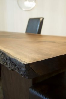 Solid wood table with bark