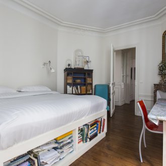 Bedroom in a studio apartment