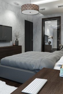 Черна врата и тъмен паркет в спалнята