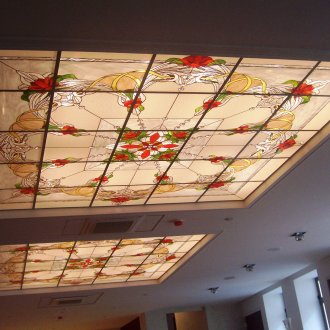 Stained glass square ceiling inserts with a floral pattern