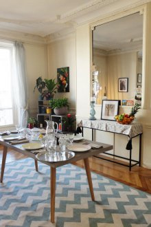 Furnishing studio apartment with a mirror in the living room