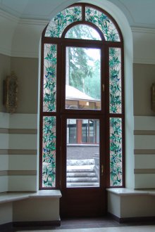 Arched stained glass in the interior