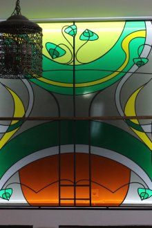 Large stained glass window in the interior of the apartment