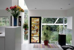 Stained glass window in the interior of a bright house