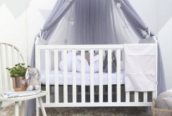 Four-poster bed for newborn