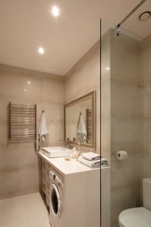 Пералнята в банята с панел