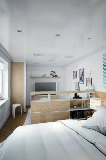 Bilik tidur di pangsapuri studio dengan perabot