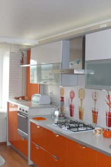 Fridge under the windowsill