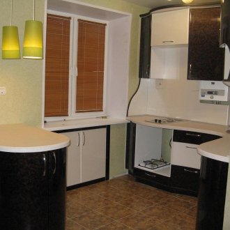 Fridge under the window cabinet