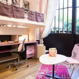 Design a room for a teenager with an attic bed