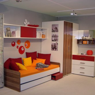 Design room for teenagers with glossy furniture
