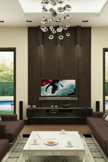 Интериор на хола с черен плосък телевизор