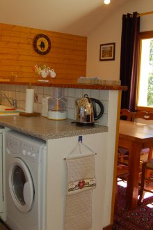 Пералня в кухнята в къщата